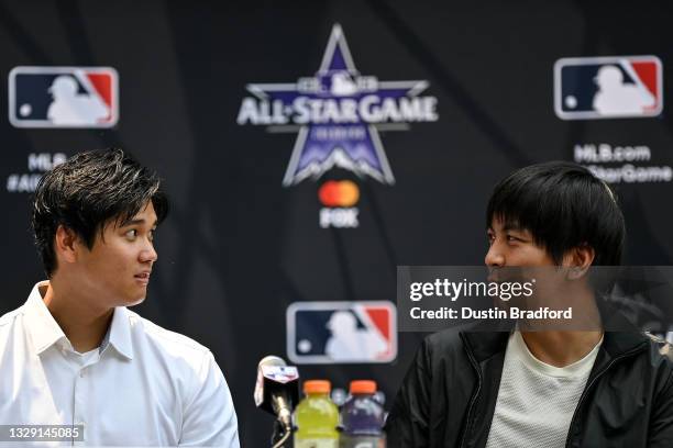 Shohei Ohtani of the Los Angeles Angels and interpreter Ippei Mizuhara speak in a press conference revealing the All Star starting lineups at...