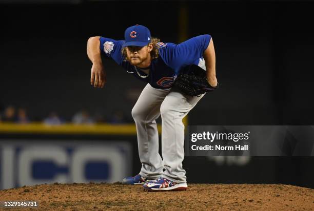 Craig Kimbrel of the Chicago Cubs delivers a ninth inning pitch against the Arizona Diamondbacks at Chase Field on July 16, 2021 in Phoenix, Arizona....