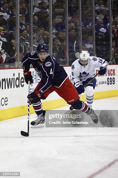 John Moore of the Columbus Blue Jackets moves the puck up ice during the game against the Toronto Maple Leafs on November 3, 2011 at Nationwide Arena...