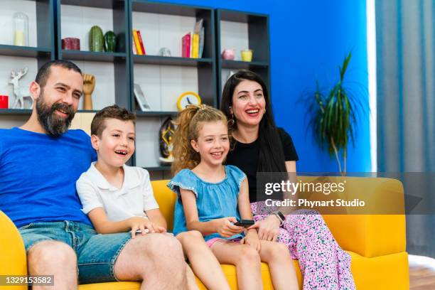 Family Watching Tv Cartoon Photos and Premium High Res Pictures - Getty Images Family Watching Tv Cartoon Photos and Premium High Res Pictures - Getty Images