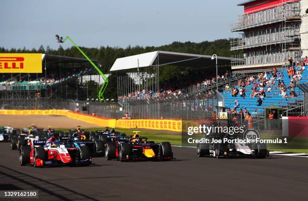 Robert Shwartzman of Russia and Prema Racing , Juri Vips of Estonia and Hitech Grand Prix and Christian Lundgaard of Denmark and ART Grand Prix...