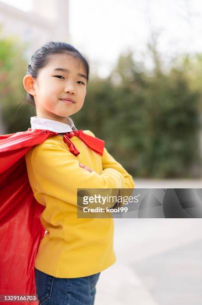 supergirl arms crossed - girl arms crossed stock pictures, royalty-free photos & images
