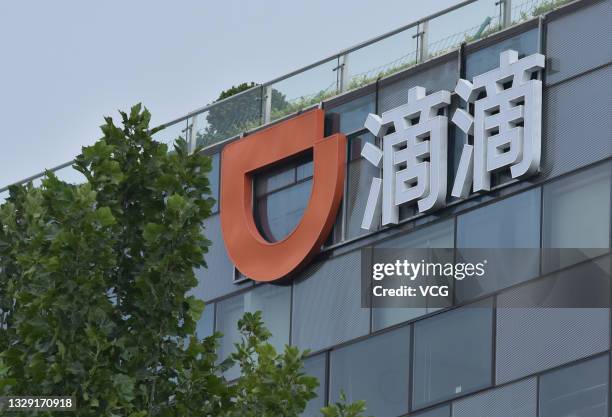Logo of Chinese ride-sharing company Didi is pictured at its headquarters' building on June 17, 2021 in Beijing, China.