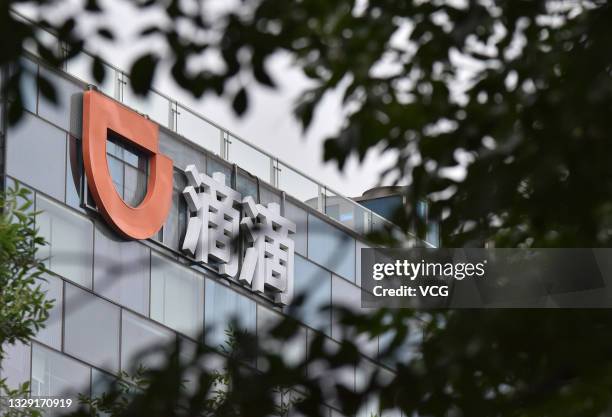 Logo of Chinese ride-sharing company Didi is pictured at its headquarters' building on June 17, 2021 in Beijing, China.