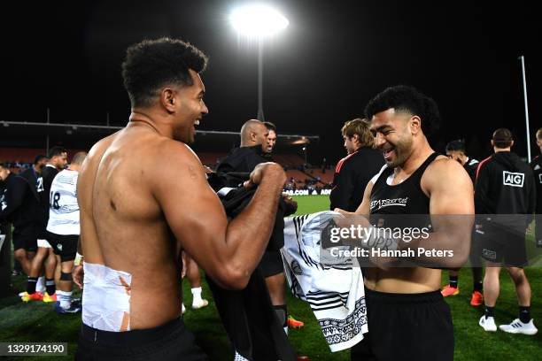 Ben Volavola of Fiji swaps jerseys with Richie Mo’unga of the All Blacks following the International Test Match between the New Zealand All Blacks...