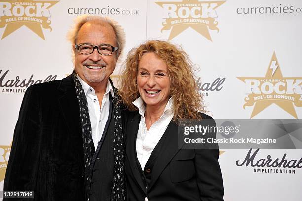 Mick Jones of Foreigner and guest arriving on the red carpet for the Classic Rock Awards, taken on November 10, 2010.