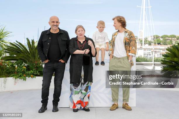 Gaspar Noé, Françoise Lebrun, Kylian Dheret and Alex Lutz attend the "Vortex" photocall during the 74th annual Cannes Film Festival on July 17, 2021...