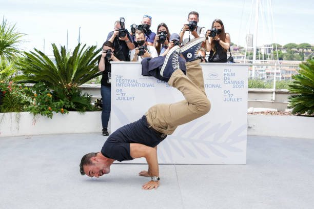 FRA: "OSS 117: From Africa With Love" Photocall - The 74th Annual Cannes Film Festival