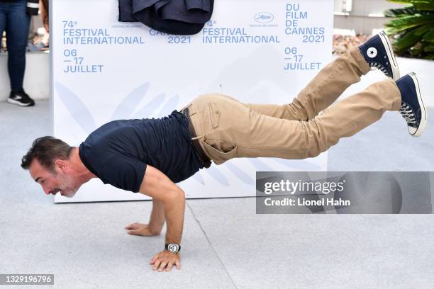 Jean Dujardin attends the "OSS 117: From Africa With Love" photocall during the 74th annual Cannes Film Festival on July 17, 2021 in Cannes, France.