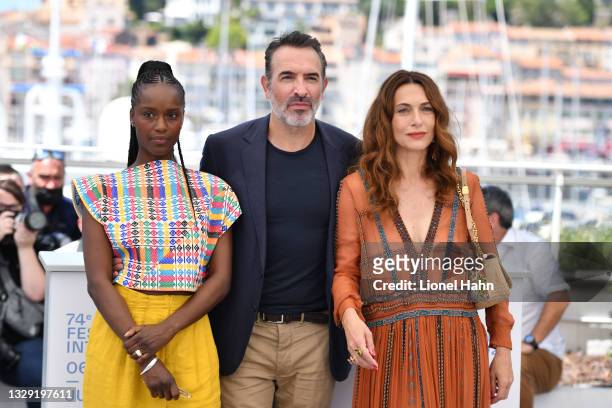 Nicolas Bedos, Pierre Niney and Jean Dujardin attend the "OSS 117: From Africa With Love" photocall during the 74th annual Cannes Film Festival on...
