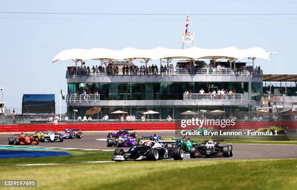 Fabienne Wohlwend of Liechtenstein and Bunker Racing leads Alice Powell of Great Britain and Racing X during the W Series Round 3 race at Silverstone...