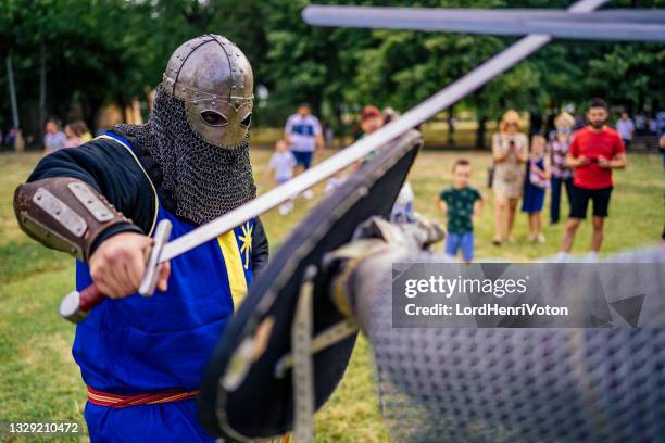 fight of medieval knights - historical reenactment stock pictures, royalty-free photos & images