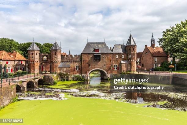historic land- and watergate the koppelpoort in amersfoort - amersfoort netherlands stock pictures, royalty-free photos & images