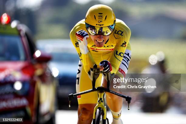 Tadej Pogačar of Slovenia and UAE-Team Emirates yellow leader jersey celebrates at arrival during the 108th Tour de France 2021, Stage 20 a 30,8km...