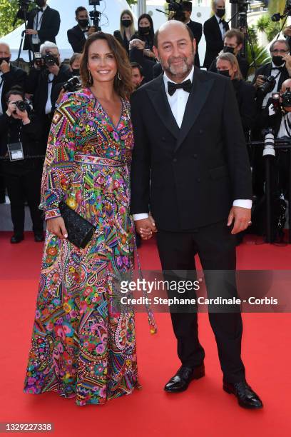 Julia Vignali and Kad Merad attend the final screening of "OSS 117: From Africa With Love" and closing ceremony during the 74th annual Cannes Film...