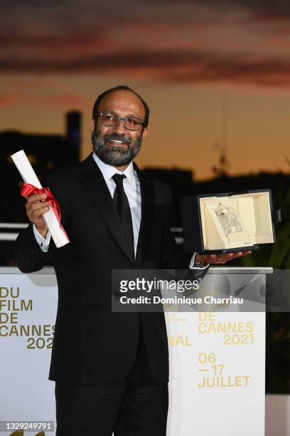 Asghar Farhadi poses with the 'Grand Prix' Ex-Aequo for 'A Hero' during the 74th annual Cannes Film Festival on July 17, 2021 in Cannes, France.