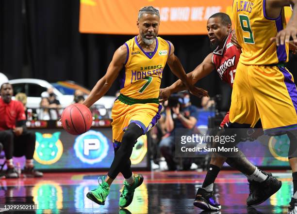 Mahmoud Abdul-Rauf of 3 Headed Monsters drives to the basket against the Trilogy in the first half during the second week of the BIG3 at the Orleans...
