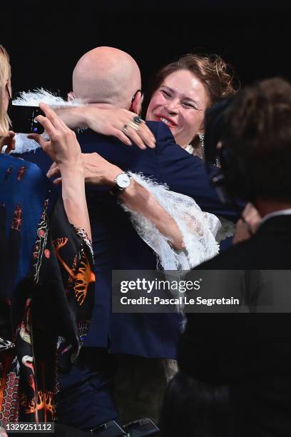 Seidi Haarla hugs Jussi Rantamaki after winning the 'Grand Prix' Ex-Aequo for 'Hytti nro 6' during the closing ceremony of the 74th annual Cannes...