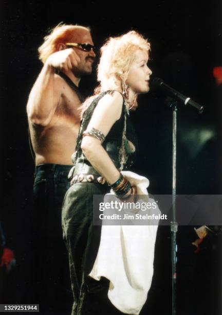 Cyndi Lauper with Jesse Ventura performs at the Roy Wilkins Auditorium in St. Paul, Minnesota on December 9, 1984.