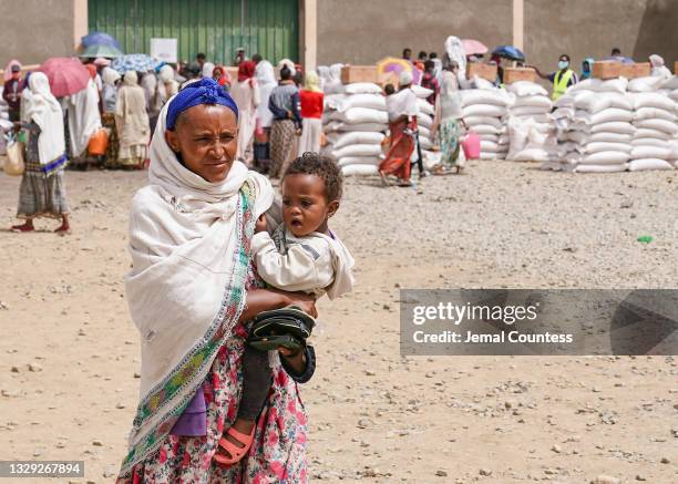 Resident of Geha subcity waits to receive food aid at an aid operation run by USAID, Catholic Relief Services and the Relief Society of Tigray on...