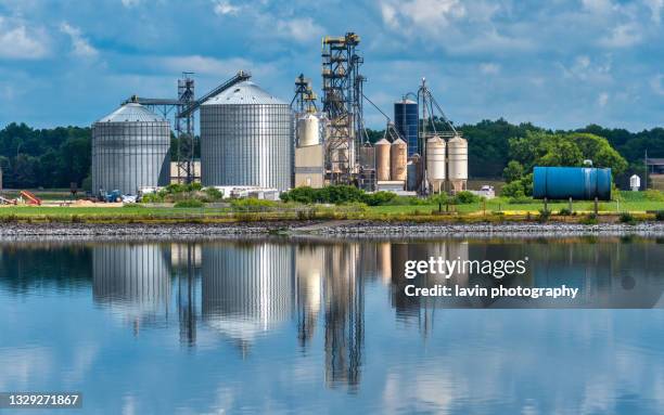 silo reflections food storage farm - minnesota river stock pictures, royalty-free photos & images