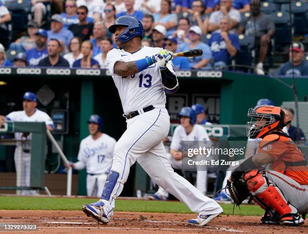 Salvador Perez of the Kansas City Royals hits a single in the first inning against the Baltimore Orioles at Kauffman Stadium on July 17, 2021 in...