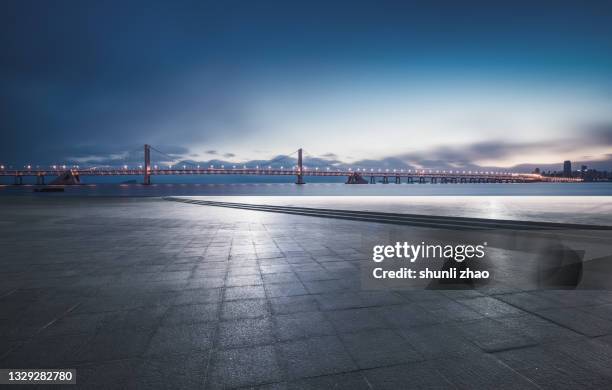 the square by the sea at night - bay ストックフォトと画像