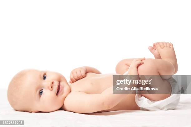 cute little baby, lying on back and smile. - baby　smile ストックフォトと画像