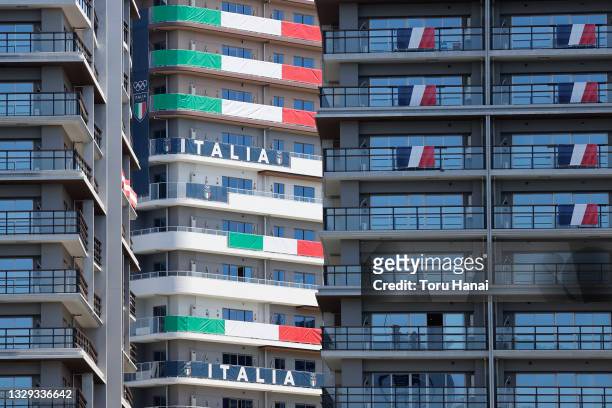 National flags of Italy and France hanging on residential buildings in the athletes' village for the Tokyo Olympics on July 18, 2021 in Tokyo, Japan.