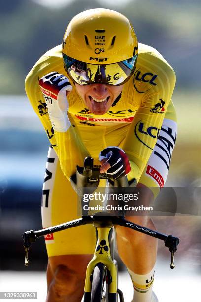 Tadej Pogačar of Slovenia and UAE-Team Emirates yellow leader jersey celebrates at arrival during the 108th Tour de France 2021, Stage 20 a 30,8km...