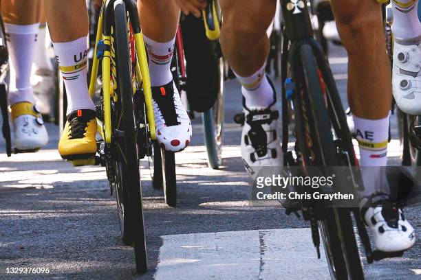 Yellow and Polka Dot Shoes of Tadej Pogačar of Slovenia and UAE-Team Emirates Yellow Leader Jersey during the 108th Tour de France 2021, Stage 21 a...