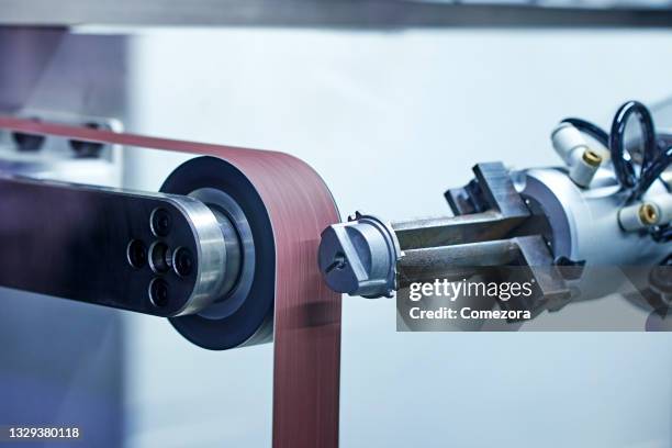 grinding machine parts - metallic belt stock pictures, royalty-free photos & images