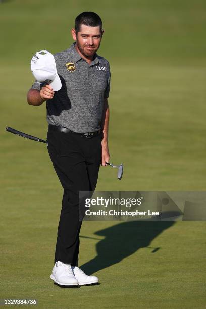 Louis Oosthuizen of South Africa acknowledges the fans on the green of the 18th hole during Day Four of The 149th Open at Royal St George’s Golf Club...