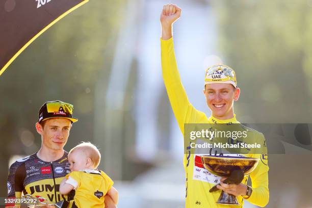 Jonas Vingegaard of Denmark and Team Jumbo-Visma and his daughter Frida & Tadej Pogačar of Slovenia and UAE-Team Emirates Yellow Leader Jersey...