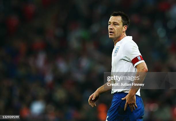 John Terry of England looks on during the international friendly match between England and Sweden at Wembley Stadium on November 15, 2011 in London,...