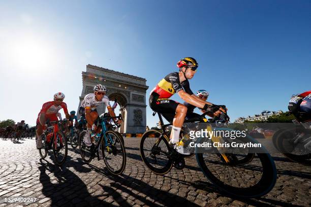 Wout Van Aert of Belgium and Team Jumbo-Visma & The Peloton passing in front of The Arc De Triomphe at Paris City during the 108th Tour de France...