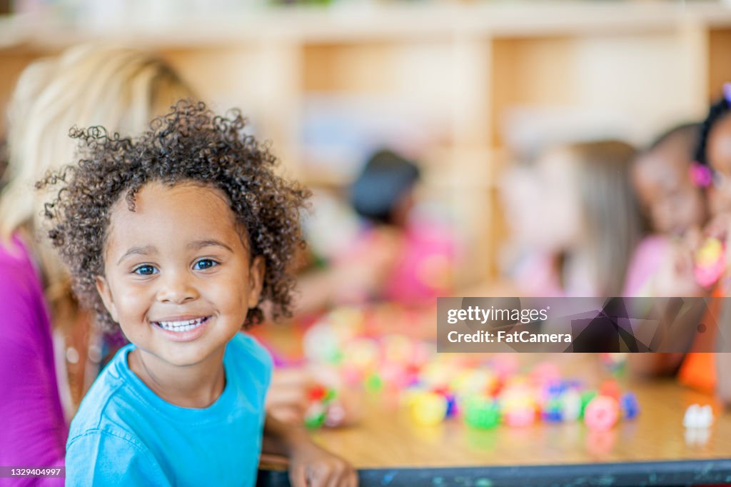 Preschool kid enjoying himself