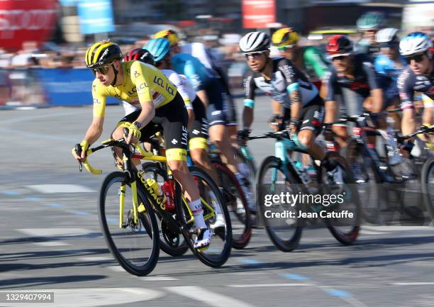 Race Leader's Yellow Jersey Tadej Pogacar of Slovenia and UAE Team Emirates during final stage 21 of the 108th Tour de France 2021, a flat stage of...