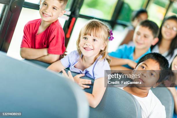 Kids Using Bus Smiling Kids On A Bus Photos and Premium High Res Pictures - Getty Images