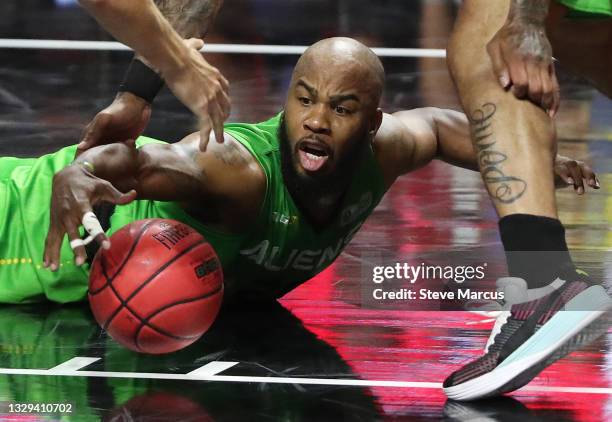 Andre Owens of Aliens goes after a loose ball against Ball Hogs during week two of the BIG3 at the Orleans Arena on July 18, 2021 in Las Vegas,...