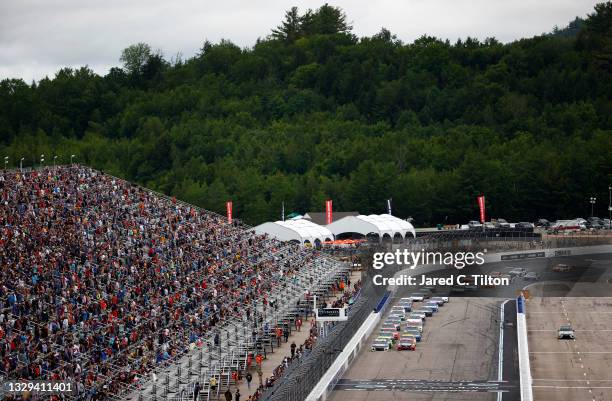 General view of the restart after a rain delay during the NASCAR Cup Series Foxwoods Resort Casino 301 at New Hampshire Motor Speedway on July 18,...