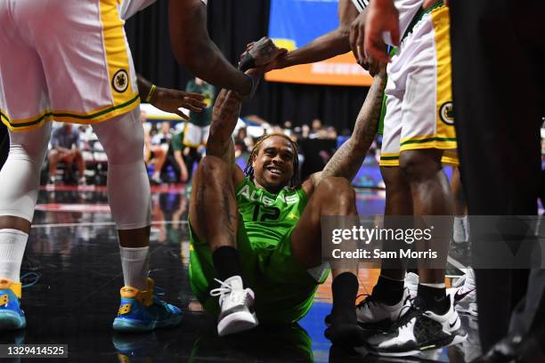 Shannon Brown of Aliens is helped up by Aliens players during week two of the BIG3 at the Orleans Arena on July 18, 2021 in Las Vegas, Nevada.