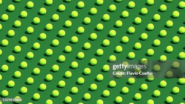 seamless pattern of tennis balls filling the frame - tennisbal stock-fotos und bilder