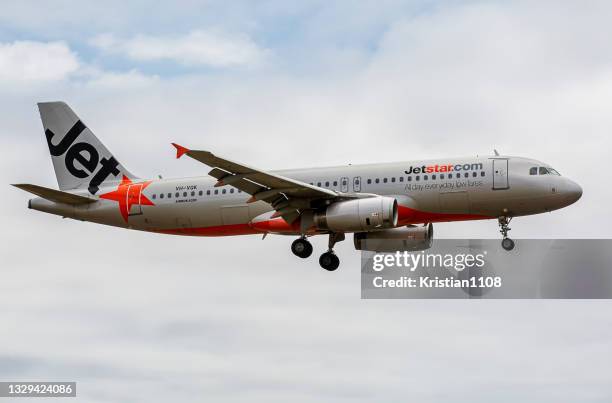 jetstar airbus a320 - jetstar stockfoto's en -beelden