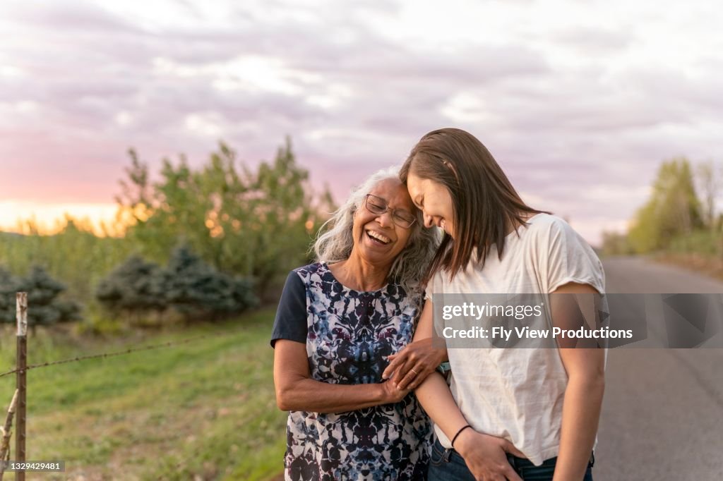 Ethnic Senior Mother Walking With Her Adult Daughter