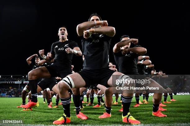 Rieko Ioane, Samuel Whitelock and Codie Taylor of the All Blacks perform the haka with the team ahead of during the International Test Match between...