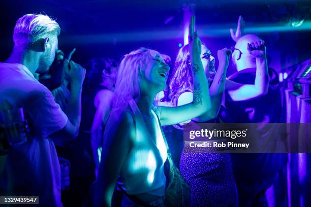 People dancing at Egg London nightclub in the early hours of July 19, 2021 in London, England. As of 12:01 on Monday, July 19, England will drop most...