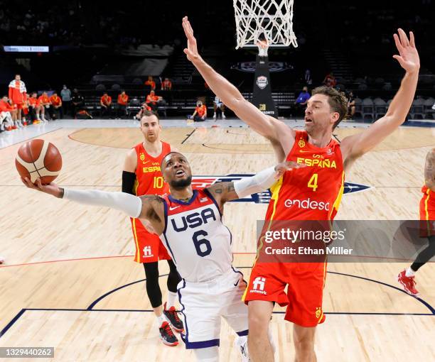Damian Lillard of the United States shoots against Pau Gasol of Spain during an exhibition game at Michelob ULTRA Arena ahead of the Tokyo Olympic...