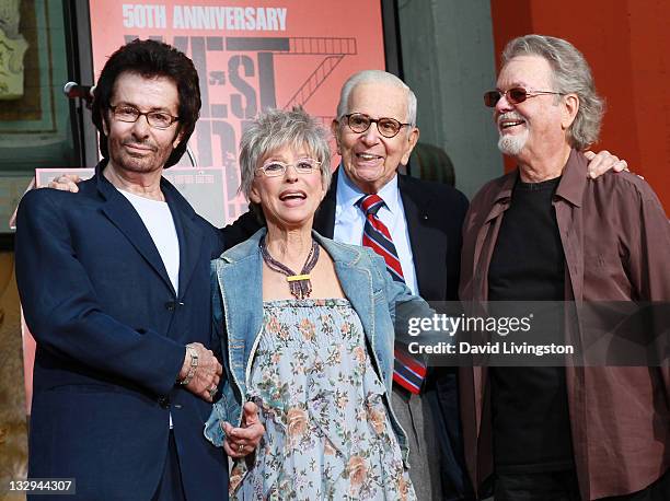 Actors George Chakiris and Rita Moreno, producer Walter Mirisch and actor Russ Tamblyn attend the actors' hand and footprint ceremony celebrating the...