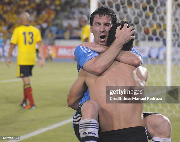 Lionel Messi and Sergio Aguero from Argentina, celebrating the second goal during a match between Colombia and Argentina as part of the fourth round...